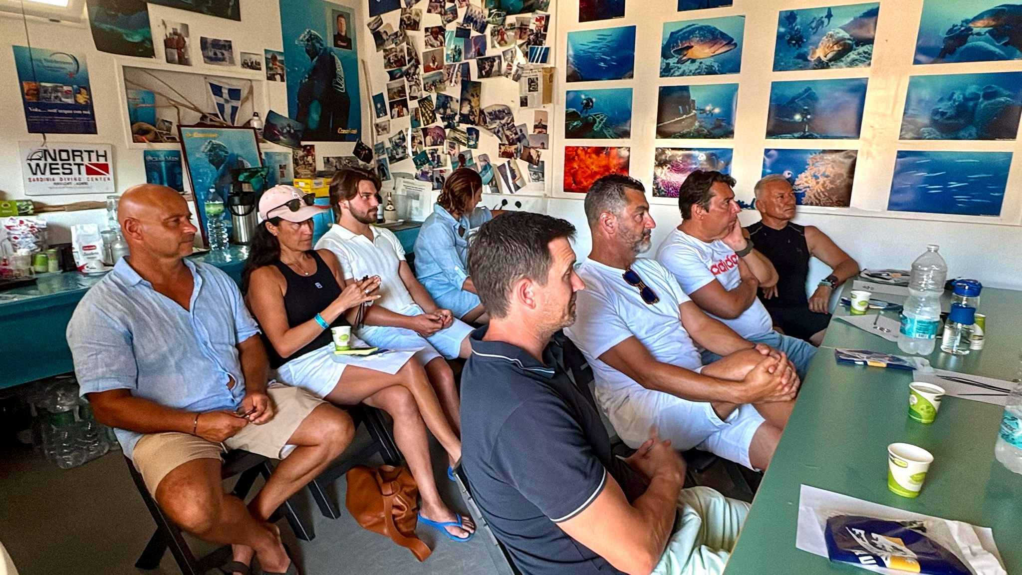 Participants attending the official safety briefing before the Bonifacio Strait crossing.